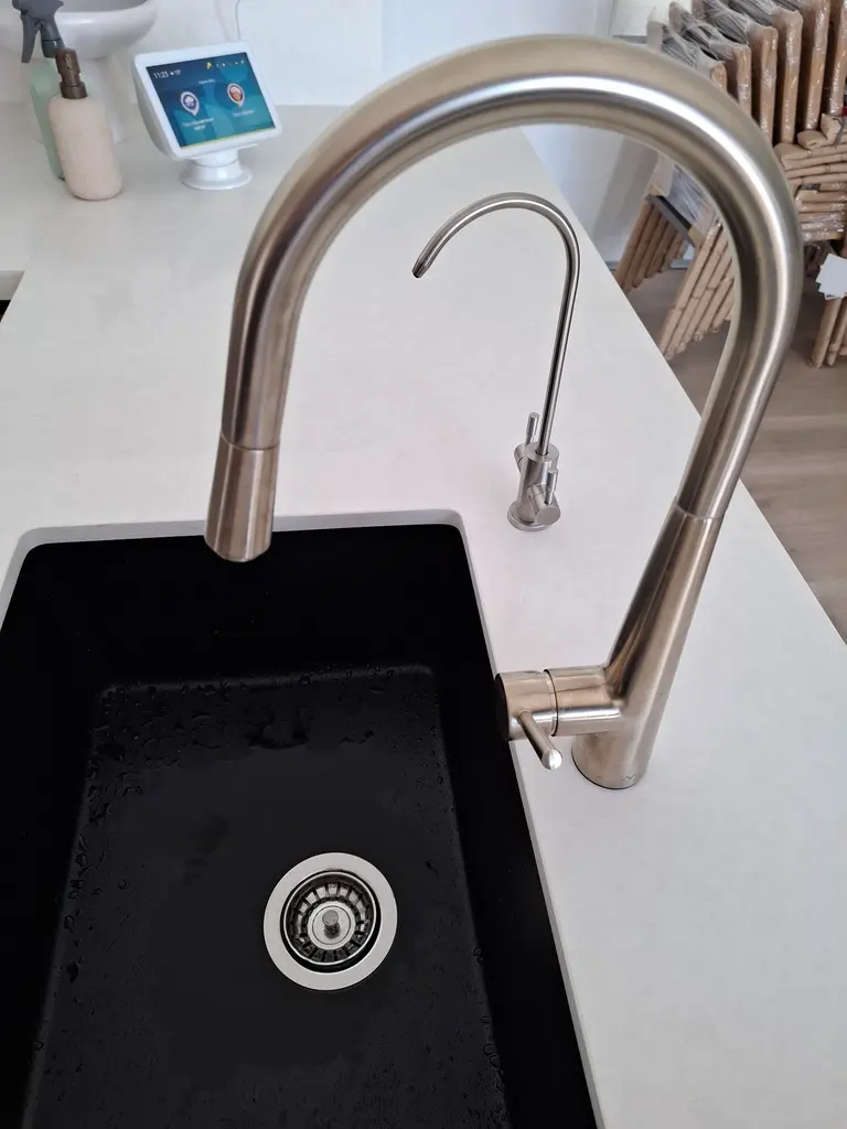 3-way mixer tap and RO faucet installed on kitchen benchtop